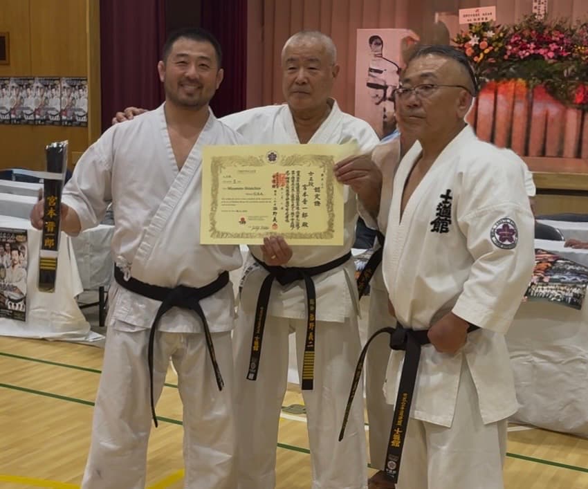 Shihan Miyamoto with senior Shidokan masters receiving his 5th Dan certification